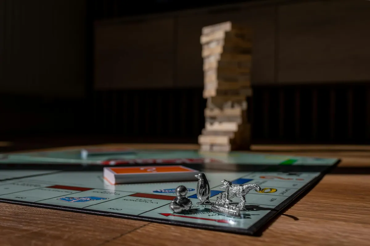 A board game spread out on a wooden table